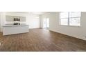 Bright dining area with wood-look floors at 2254 Doe Tracks Ct, Monument, CO 80132