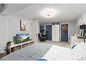 Bright bedroom with a built-in wardrobe and plenty of natural light at 1138 E 14Th Ave # 14, Denver, CO 80218