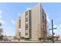 Modern high-rise building with street view and landscaping at 777 N Washington St # 1203, Denver, CO 80203