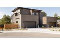 Contemporary home with two-car garage, modern brick exterior, and low-maintenance landscaping at 16113 W 14Th Ave, Golden, CO 80401