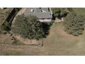 Aerial view of home, showing house and surrounding land at 6803 S Liverpool St, Centennial, CO 80016