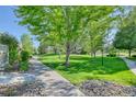 Landscaped community green space with walkways at 8016 E Fairmount Dr, Denver, CO 80230
