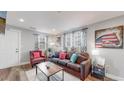 Living room with comfy seating and western decor at 3040 W 66Th Ave, Denver, CO 80221