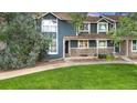 Two-story townhome with a blue exterior and stone accents at 3807 Paseo Del Prado, Boulder, CO 80301