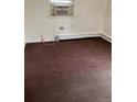 Simple bedroom with brown carpet, window, and air conditioning unit at 420 E 45Th Ave, Denver, CO 80216