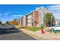Front view of the apartment building and parking area at 2715 W 86Th Ave # 21, Westminster, CO 80031
