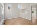 Bright living room with hardwood floors and high ceilings at 5483 S Versailles St, Aurora, CO 80015