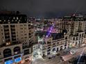 Night view of the building and surrounding city lights at 925 N Lincoln St # 14C, Denver, CO 80203