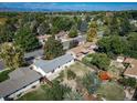 Aerial view showcasing the house's backyard and neighborhood setting at 1340 Daphne St, Broomfield, CO 80020