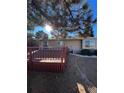 Back deck with red railings, overlooking a yard at 18269 E Hampden Pl, Aurora, CO 80013