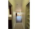 View down hallway showcasing a spacious living room with fireplace at 467 S Memphis Way # 17, Aurora, CO 80017
