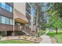 Attractive building exterior with landscaping and walkway at 6940 E Girard Ave # 409, Denver, CO 80224