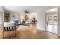 Living room with hardwood floors, neutral decor, and an open floor plan at 5322 E Colorado Ave, Denver, CO 80222