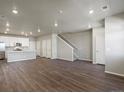 Spacious living room with hardwood floors and open concept design at 22250 E 8Th Ave, Aurora, CO 80018