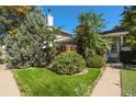 Inviting home exterior with landscaping and a walkway at 13 Nome Way # A, Aurora, CO 80012