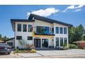 Two-story modern home with clean lines and a stylish facade at 4960 S Lipan Dr, Englewood, CO 80110