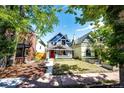 Two-story craftsman style home with landscaping at 212 S Sherman St, Denver, CO 80209