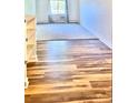 Bright living room with wood floors and carpeted area at 747 W 96Th Ave # 10, Thornton, CO 80260