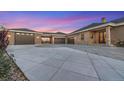 Expansive driveway leading to a large home with attached garage at 3191 Sparrow Hawk Ln, Berthoud, CO 80513