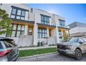 Modern townhome community with clean lines and landscaping at 4214 E 8Th Pl, Denver, CO 80220