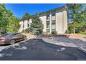Side view of building showcasing parking and landscaping at 2160 S Vaughn Way # 304C, Aurora, CO 80014