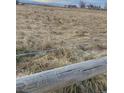 24 acres of vacant land with a barbed wire fence at 13767 County Road 8, Fort Lupton, CO 80621