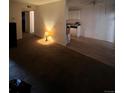 Living Room with view of kitchen and hallway at 10772 E Exposition Ave # 141, Aurora, CO 80012