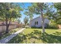 House exterior with a spacious front yard and walkway at 1181 Yosemite St, Denver, CO 80220