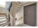 Exterior view of building entrance and stairway at 14904 E Hampden Cir # C7, Aurora, CO 80014