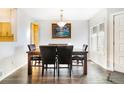 Bright dining room with a large table and ample seating at 7373 E Iowa Ave # 1101, Denver, CO 80231