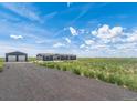 Ranch style home with attached garage, rural setting at 15 S County Road 197, Byers, CO 80103