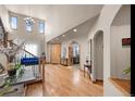 Spacious entryway with high ceilings and hardwood floors at 10215 W Wesley Dr, Lakewood, CO 80227