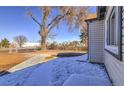 Side yard with gravel pathway and mature tree at 15360 W 44Th Ave, Golden, CO 80403