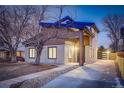 Modern two-story home with clean lines and stylish exterior at 1080 Ivy St, Denver, CO 80220