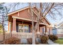 Home's exterior, featuring a welcoming front porch at 12955 Vallejo Cir, Westminster, CO 80234
