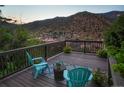 Deck with mountain views and seating area at 533 Pine Slope Rd, Idaho Springs, CO 80452