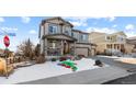 Two-story house on a corner lot with a spacious driveway at 8104 El Jebel Loop, Castle Rock, CO 80108