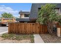 Updated townhome with wood fence and private entrance at 7995 E Mississippi Ave # C2, Denver, CO 80247