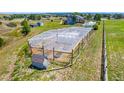 Well-maintained garden with protective netting at 36023 Winchester Rd, Elizabeth, CO 80107