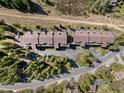 Top-down view of a row of condos and surrounding landscape at 840 Four O Clock Rd # A2F, Breckenridge, CO 80424