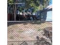 Large backyard with chain link fence at 2831 Lawrence St, Denver, CO 80205