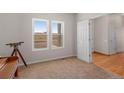 Spacious home office with carpeting and large windows at 35505 E 149Th Ct, Hudson, CO 80642
