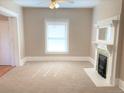 Bright living room featuring a fireplace and hardwood floors at 523 W 8Th Ave, Denver, CO 80204