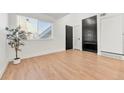 Bright living room featuring hardwood floors and a fireplace at 17004 E Tennessee Dr # 210, Aurora, CO 80017