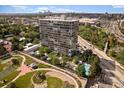 Aerial view of building, pool, and landscaping at 3100 E Cherry Creek South Dr # 1002, Denver, CO 80209