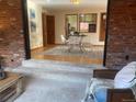 Bright dining area with a glass table and modern chairs at 805 W 6Th Ave, Broomfield, CO 80020