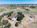 Ranch home with a large yard and outbuildings at 7846 Village Rd, Parker, CO 80134