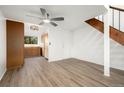 Kitchen with light wood cabinets and view into living area at 326 Wright St # 304, Lakewood, CO 80228