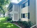 Building showcases a well-maintained exterior and landscaping at 600 S Clinton, Denver, CO 80247