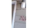 Exterior view of building, unit number 201 visible at 12043 W Cross Dr # 201, Littleton, CO 80127